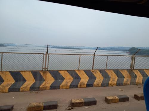 view of netravathi river while crossing netravati road bridge