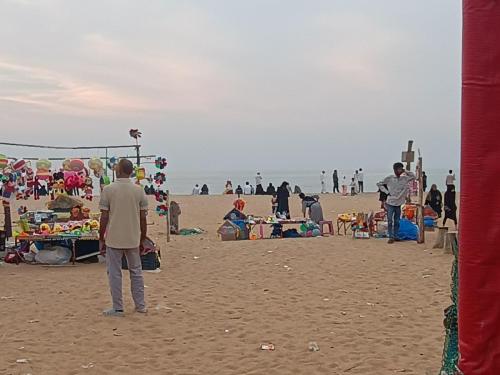 visitors relaxing at ullal beach